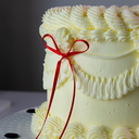 NOEUDS DECORATIFS EN TOPPER ROUGE PAQUET DE 8 PCS